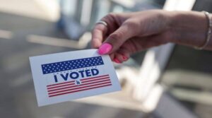 A person holds an "I voted" sticker as people vote in the U.S. presidential election. .A GOP Donor Who Gave $2.5 Million for a Voter Fraud Investigation. He put - I Want My Money Back | A GOP Donor Who Gave $2.5 Million for a Voter Fraud Investigation.